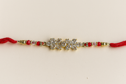 Elegant Twin Petal Rakhi with Zircon Stones