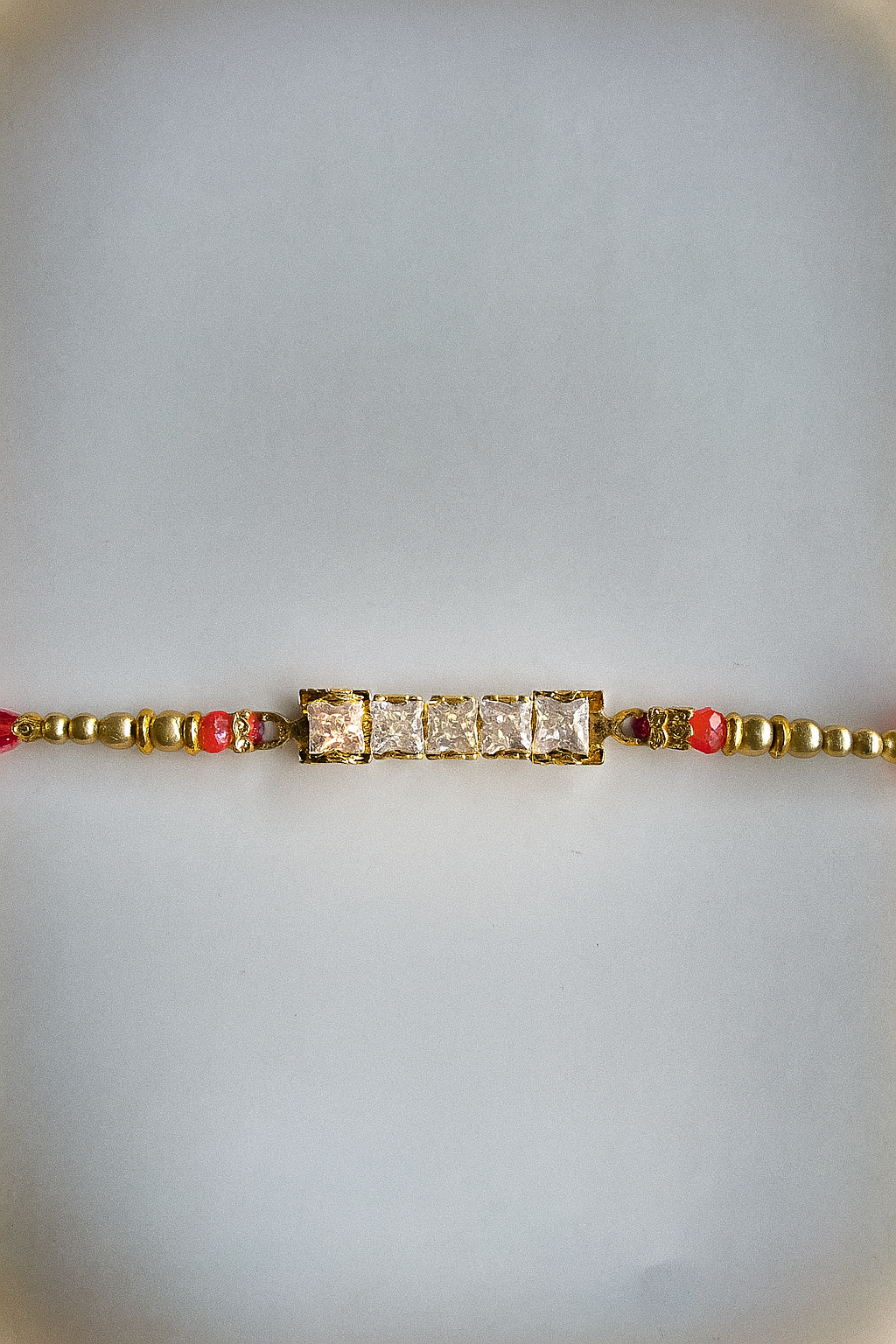 Elegant Crystal Square Rakhi with Beaded Detailing