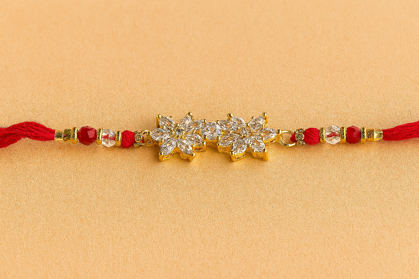 Elegant Twin Petal Rakhi with Zircon Stones